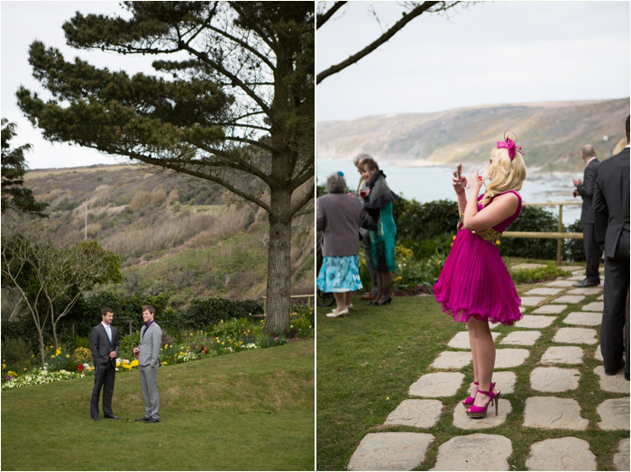 Wedding guests mingle on the lawn at a wedding in Cornwall Wedding Photographer in Cornwall